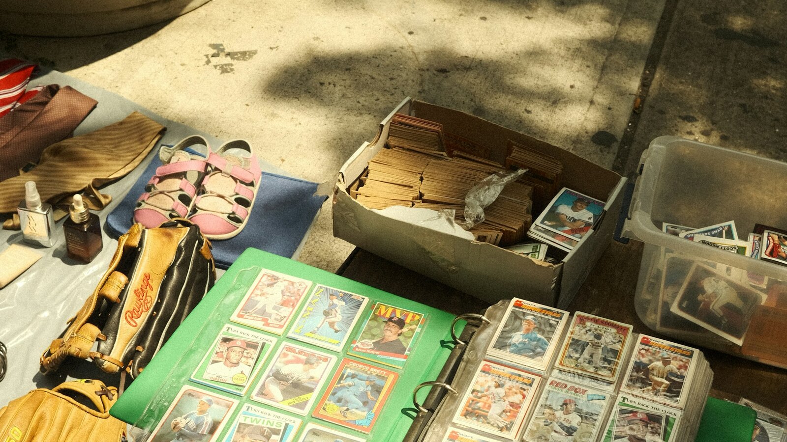 Vintage sports cards and memorabilia on a collector table